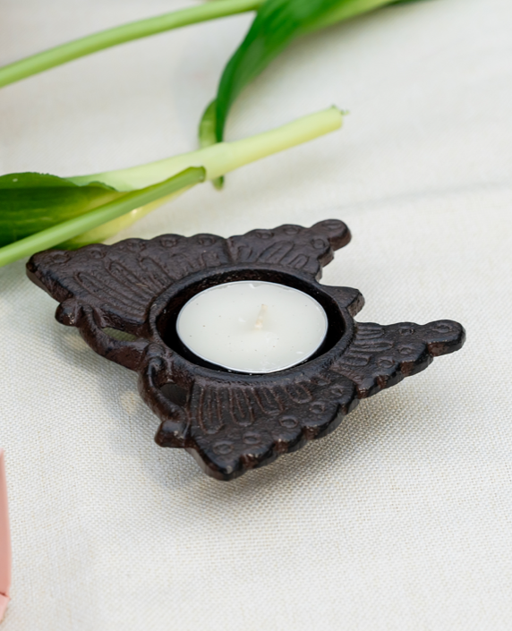 Cast iron butterfly candle holder